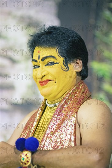 Kathakali performer or mime, 60 years old, with painted face, Kochi Kathakali Centre, Kochi, Kerala, India, Asia