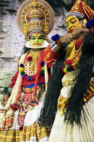 Kathakali performer or mime, 38 and 60 years old, on stage at the Kochi Kathakali Centre, Kochi, Kerala, India, Asia