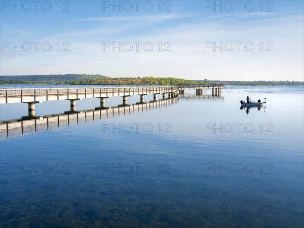 Pier in the harbour and fishing boat, Braunsbedra Marina, Geiseltalsee, Saxony-Anhalt, Germany, Europe