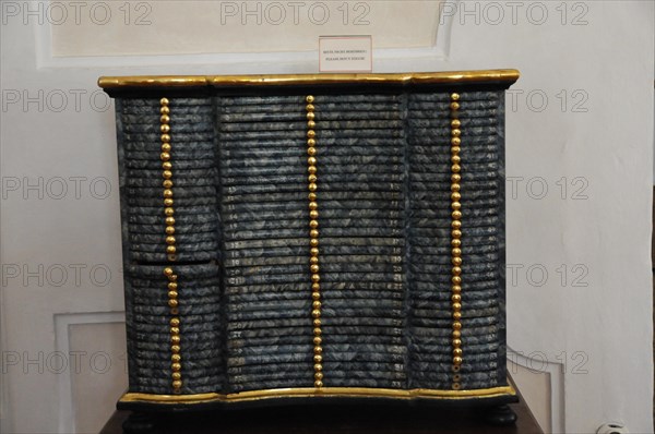 Langenburg Castle, Black antique chest of drawers with gold-coloured accents and textured surface, Langenburg Castle, Langenburg, Baden-Wuerttemberg, Germany, Europe