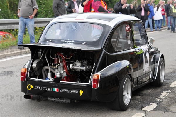 A black classic racing car with open tailgate shows the engine, SOLITUDE REVIVAL 2011, Stuttgart, Baden-Wuerttemberg, Germany, Europe