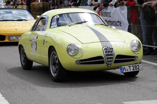 A yellow Alfa Romeo sports car in vintage style on the race track, SOLITUDE REVIVAL 2011, Stuttgart, Baden-Wuerttemberg, Germany, Europe