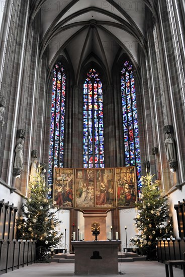 Interior, altar of St Mary's Chapel, market square, Wuerzburg, interior view of a church with Christmas trees next to the high altar and stained glass in the background, Wuerzburg, Lower Franconia, Bavaria, Germany, Europe