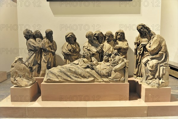 St Kilian's Cathedral, St Kilian's Cathedral, Wuerzburg, A wood-carved sculpture group shows a biblical mourning scene, possibly the Lamentation of Christ, Wuerzburg, Lower Franconia, Bavaria, Germany, Europe