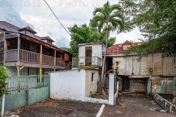 Deshaies, historic Caribbean wooden building of a street in Guadeloupe, Caribbean, French Antilles