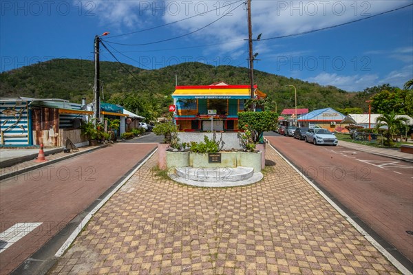 Deshaies, historic Caribbean wooden building of a street in Guadeloupe, Caribbean, French Antilles