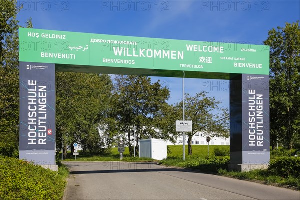 Entrance portal of Reutlingen University, Reutlingen University, large representative gate, gate, entrance, to the university campus, welcome words, writing, letters, welcome, benvenuti, bienvenue, selamat datang, different languages, Texoversum, campus, place of learning, street, Reutlingen, Baden-Wuerttemberg, Germany, Europe