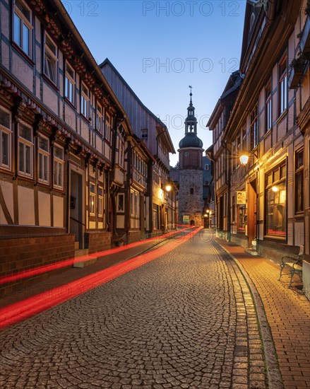 Niedergasse with Saigerturm at dusk, half-timbered houses and cobblestones, Stolberg im Harz, Saxony-Anhalt, Germany, Europe