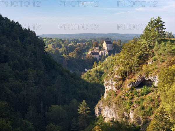 View of the Puettlach valley with rocks, forests and Pottenstein Castle, Franconian Switzerland, Franconian Alb, Upper Franconia, Franconia, Bavaria