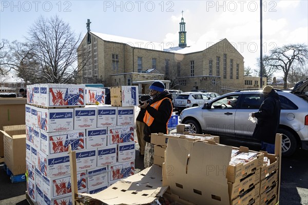 Detroit, Michigan, Free food is distributed to people attending a community health fair