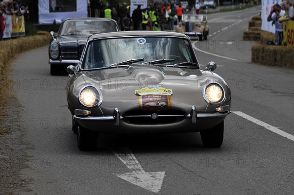 Silver Jaguar E-Type on the road at a classic car race, SOLITUDE REVIVAL 2011, Stuttgart, Baden-Wuerttemberg, Germany, Europe