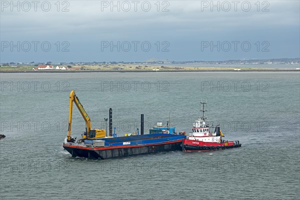 Dredger clearing fairway, harbour, Dublin, Republic of Ireland