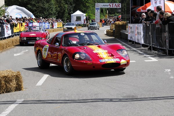 Red Renault sports car drives on a race track with a crowd during the day, SOLITUDE REVIVAL 2011, Stuttgart, Baden-Wuerttemberg, Germany, Europe