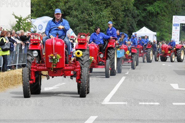 Porsche Diesel tractors, in a parade, driven by people in blue overalls, SOLITUDE REVIVAL 2011, Stuttgart, Baden-Wuerttemberg, Germany, Europe