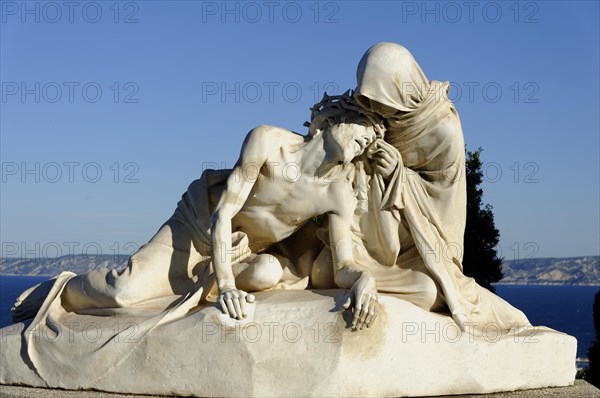 Church of Notre-Dame de la Garde, Marseille, Monumental white sculpture against a sky and sea background, Marseille, Departement Bouches-du-Rhone, Region Provence-Alpes-Cote d'Azur, France, Europe