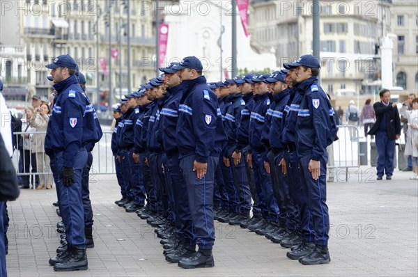 Marseille City Hall, row of police officers in uniform in an urban environment, Marseille, Bouches-du-Rhone department, Provence-Alpes-Cote d'Azur region, France, Europe