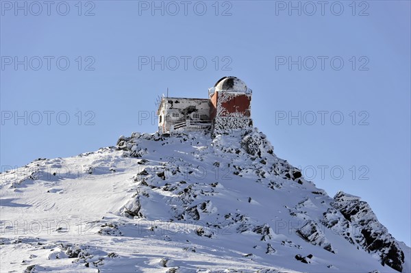 Observatory on Pico del Veleta, 3392m, Gueejar-Sierra, Sierra Nevada National Park, An observatory covered with snow perched on a mountain peak, Costa del Sol, Andalusia, Spain, Europe