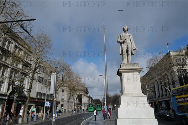 The Sir John Gray monument in O'Connell Street with the Spire in the background. Dublin, Ireland, Europe