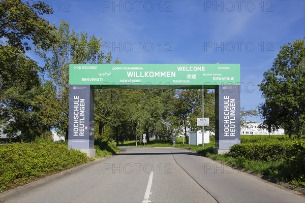 Entrance portal of Reutlingen University, Reutlingen University, large representative gate, gate, entrance, to the university campus, welcome words, writing, letters, welcome, benvenuti, bienvenue, selamat datang, different languages, Texoversum, campus, place of learning, street, Reutlingen, Baden-Wuerttemberg, Germany, Europe