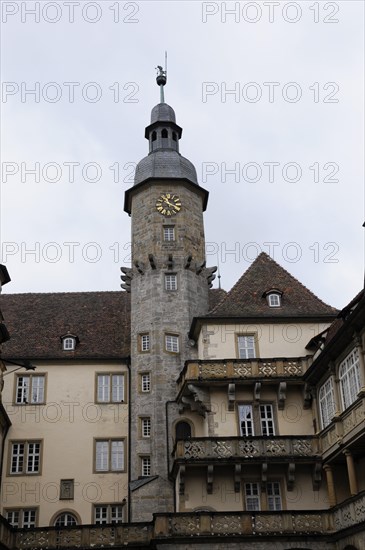 Langenburg Castle, The tower of a castle with a clock and decorations, in front of a cloudy sky, Langenburg Castle, Langenburg, Baden-Wuerttemberg, Germany, Europe
