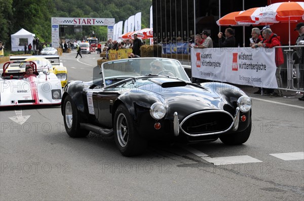 A black classic convertible racing car prepares for the start, spectators in the background, SOLITUDE REVIVAL 2011, Stuttgart, Baden-Wuerttemberg, Germany, Europe