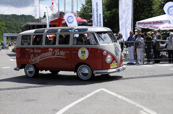 A red and white VW bus in retro design at a classic car race, SOLITUDE REVIVAL 2011, Stuttgart, Baden-Wuerttemberg, Germany, Europe