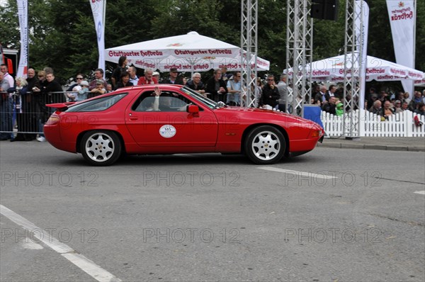 Side view of a red Porsche during a classic car race, SOLITUDE REVIVAL 2011, Stuttgart, Baden-Wuerttemberg, Germany, Europe