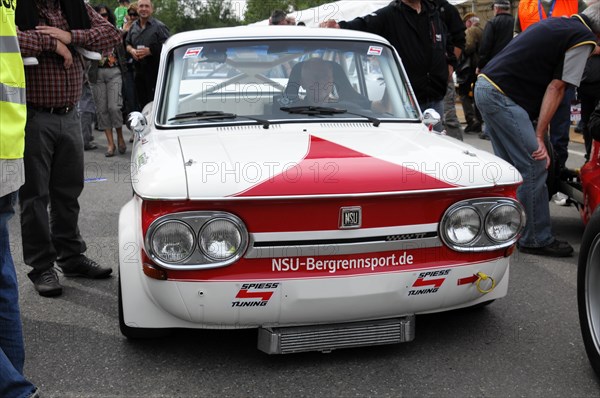 A white and red NSU hillclimb classic car stands in front of a crowd, SOLITUDE REVIVAL 2011, Stuttgart, Baden-Wuerttemberg, Germany, Europe