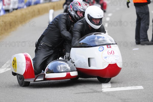 Racer on motorbike with sidecar concentrates on the race, SOLITUDE REVIVAL 2011, Stuttgart, Baden-Wuerttemberg, Germany, Europe