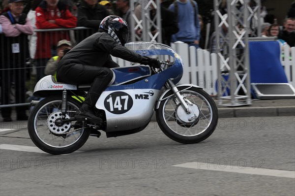 Motorcyclist at full speed on a race track with spectators in the background, SOLITUDE REVIVAL 2011, Stuttgart, Baden-Wuerttemberg, Germany, Europe