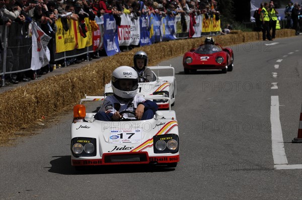 Soapbox race with two attentive drivers in white vehicles and enthusiastic spectators, SOLITUDE REVIVAL 2011, Stuttgart, Baden-Wuerttemberg, Germany, Europe