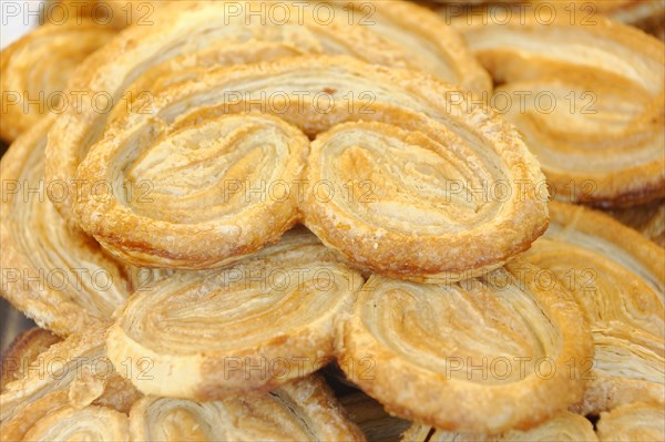 Marseille, close-up of Palmiers puff pastry, which is baked golden brown, Marseille, Departement Bouches-du-Rhone, Region Provence-Alpes-Cote d'Azur, France, Europe