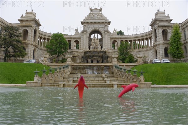 Palais Longchamp, Marseille, Classicist fountain in front of a palace with a striking red sculpture in the water, Marseille, Departement Bouches-du-Rhone, Provence-Alpes-Cote d'Azur region, France, Europe