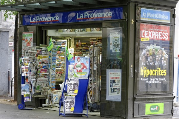 Marseille, A street kiosk with a variety of newspapers and magazines under a blue sign, Marseille, Departement Bouches-du-Rhone, Provence-Alpes-Cote d'Azur region, France, Europe