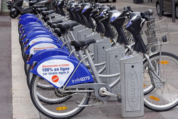 Marseille, A row of blue public bicycles parked on a city street, Marseille, Departement Bouches-du-Rhone, Provence-Alpes-Cote d'Azur region, France, Europe