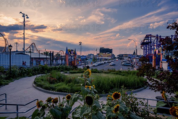 Sun sets on a warm summer day in Coney Island, Brooklyn, NY, USA, USA, North America