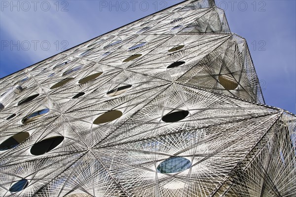 Reutlingen University, Reutlingen University, Texoversum, German University Building Award 2024 for TEXOVERSUM, modern architecture, facade made of carbon and glass fibres, mesh, innovative, identity-creating, unique facade, campus, place of learning, special, extraordinary new building for textile courses, light, airy, airy, holes, detail, architectural eye-catcher, Reutlingen, Baden-Wuerttemberg, Germany, Europe