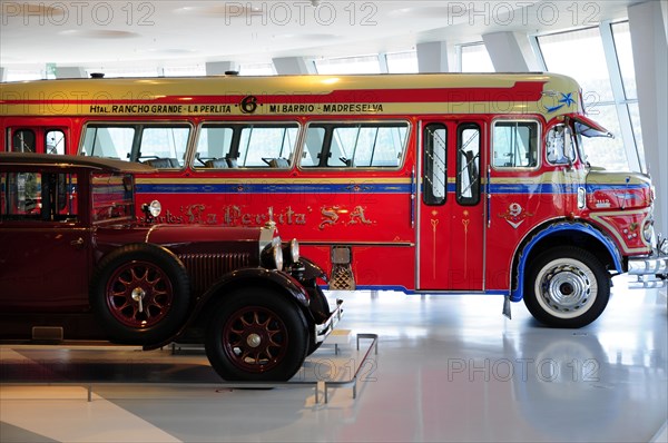 Red historic Mercedes-Benz bus as a fire engine in a vehicle exhibition, Mercedes-Benz Museum, Stuttgart, Baden-Wuerttemberg, Germany, Europe