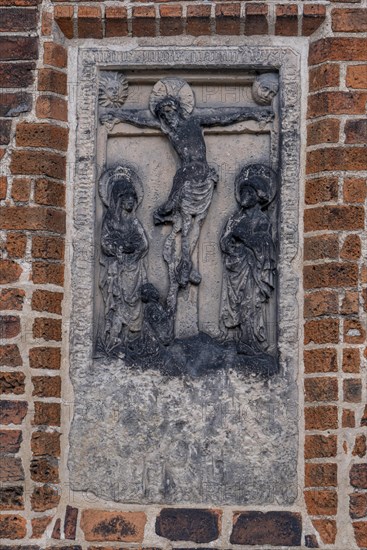 Relief with crucified Christ at the parish church of St Laurentius, Havelberg, Saxony-Anhalt, Germany, Europe