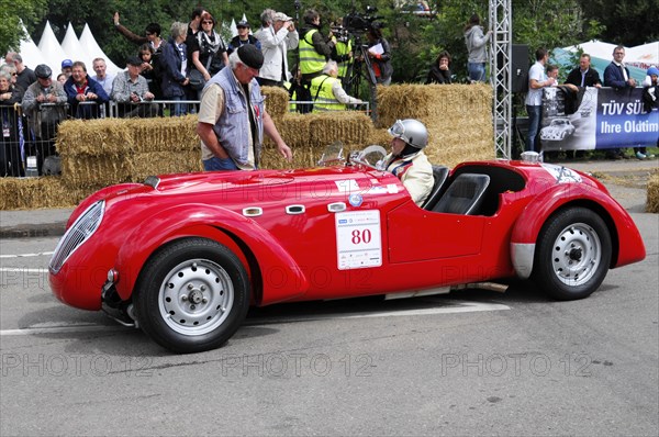 A red vintage convertible with starting number 80 on a race track, SOLITUDE REVIVAL 2011, Stuttgart, Baden-Wuerttemberg, Germany, Europe