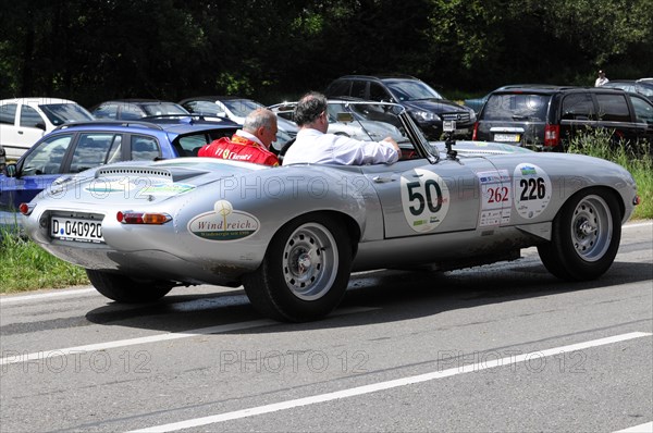 A silver vintage Jaguar is parked in a street car park, equipped for a race, SOLITUDE REVIVAL 2011, Stuttgart, Baden-Wuerttemberg, Germany, Europe