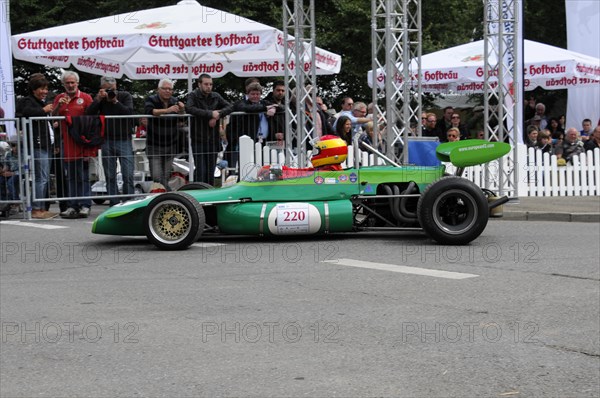 Green Formula racing car with number 220 on the race track in front of a crowd of spectators, SOLITUDE REVIVAL 2011, Stuttgart, Baden-Wuerttemberg, Germany, Europe