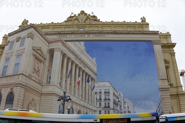 Marseille, Facade of the stock exchange and chamber of commerce building with reflection and passing bus, Marseille, Departement Bouches-du-Rhone, Region Provence-Alpes-Cote d'Azur, France, Europe