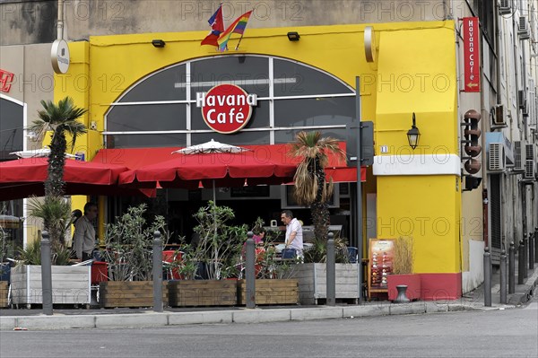 Marseille, A cafe facade with red awnings and the name Havana Cafe, Marseille, Departement Bouches-du-Rhone, Region Provence-Alpes-Cote d'Azur, France, Europe