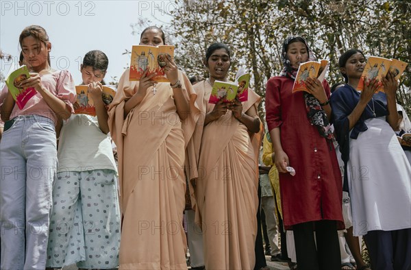 Christian devotees takes part in a perform to re-enactment of the crucifixion of Jesus Christ during a procession on Good Friday, on March 29, 2024 in Guwahati, Assam, India. Good Friday is a Christian holiday commemorating the crucifixion of Jesus Christ and his death at Calvary