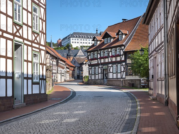 Street with half-timbered houses and cobblestones, behind the castle, Stolberg im Harz, Saxony-Anhalt, Germany, Europe