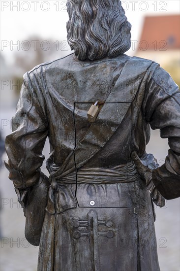 Bronze figure of Tsar Peter I of Russia by the sculptor Anton Schumann in memory of the diplomatic meeting between the Tsar and the Prussian King Friedrich Wilhelm I in 1716 in the Provost's Office in Havelberg. The sculptures of the Tsar and the Prussian King also serve as postcard vending machines, Havelberg, Saxony-Anhalt, Germany, Europe