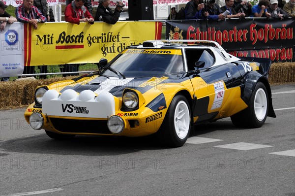 A yellow sports car with the number 184 drives past spectators during a race, SOLITUDE REVIVAL 2011, Stuttgart, Baden-Wuerttemberg, Germany, Europe