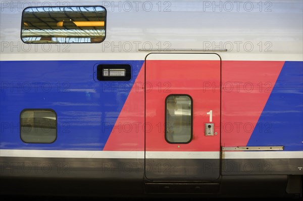 Marseille, Red-blue carriage of a TGV train, first class door clearly visible, Marseille, Departement Bouches-du-Rhone, Provence-Alpes-Cote d'Azur region, France, Europe