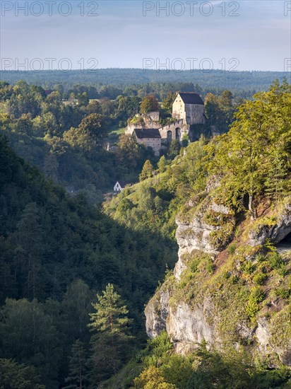 View of the Puettlach valley with rocks, forests and Pottenstein Castle, Franconian Switzerland, Franconian Alb, Upper Franconia, Franconia, Bavaria